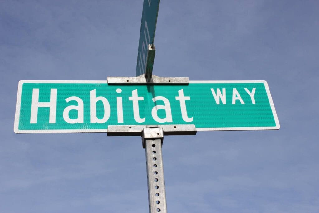 A street sign that reads habitat way.