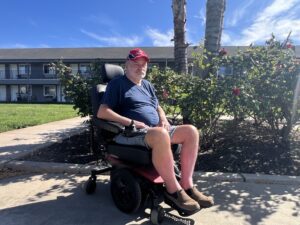 Kurt Weber sitting in a wheelchair