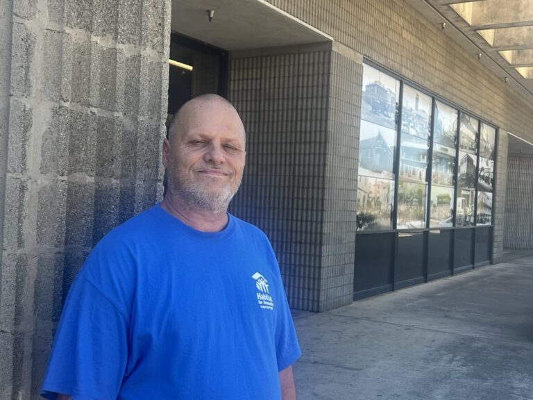 Art Branch standing in front of the ReStore